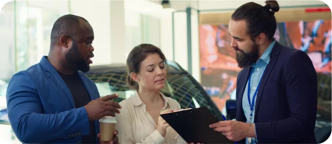 Sales team reviewing a customer order with a buyer