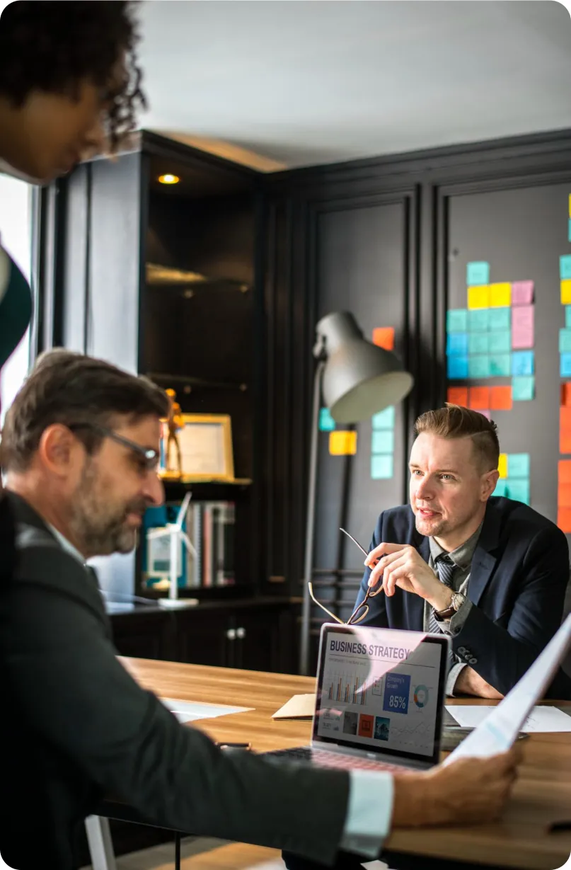 Sales leaders discussing marketplace strategy in a meeting